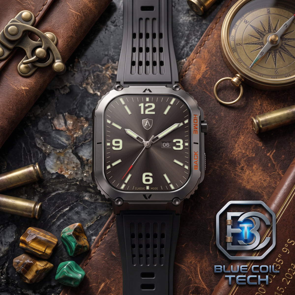 A rugged square analog watch with a dark gray metallic case, black strap, and brown dial, styled on a textured brown leather surface with brass hardware, a compass, and small stones. A Blue Coil Tech logo is visible in the bottom right corner.